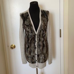 Furry sweater/jacket . Size small. Mint condition.